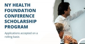 Image of person at a whiteboard with someone looking on